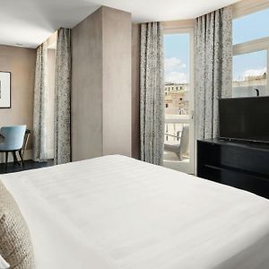 Suite "Signature" met een Slaapkamer en een King Size Bed